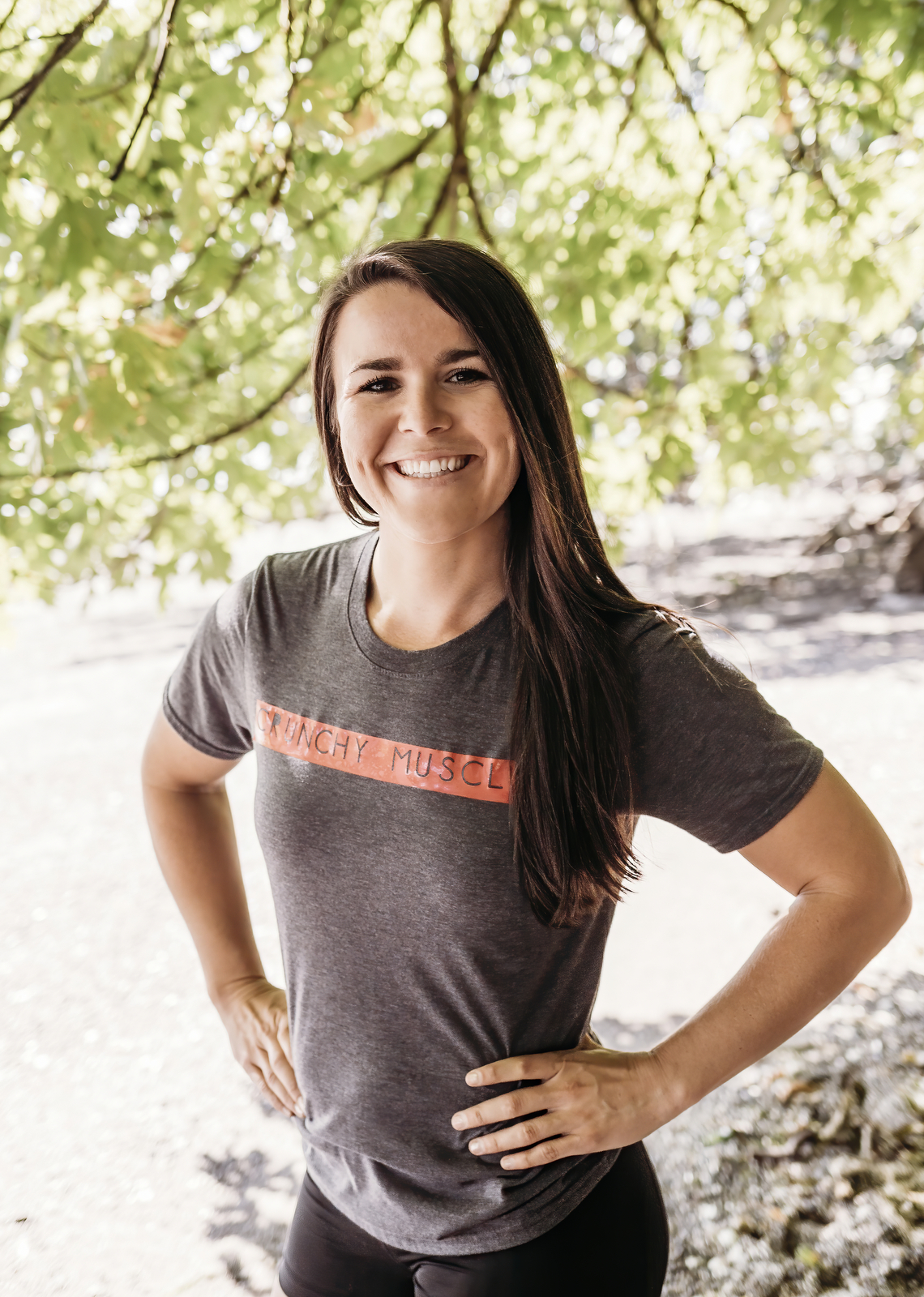 Emily Crockett, Licensed Massage Therapist at Nearing Total Health Emily Crockette, LMT standing in the forest