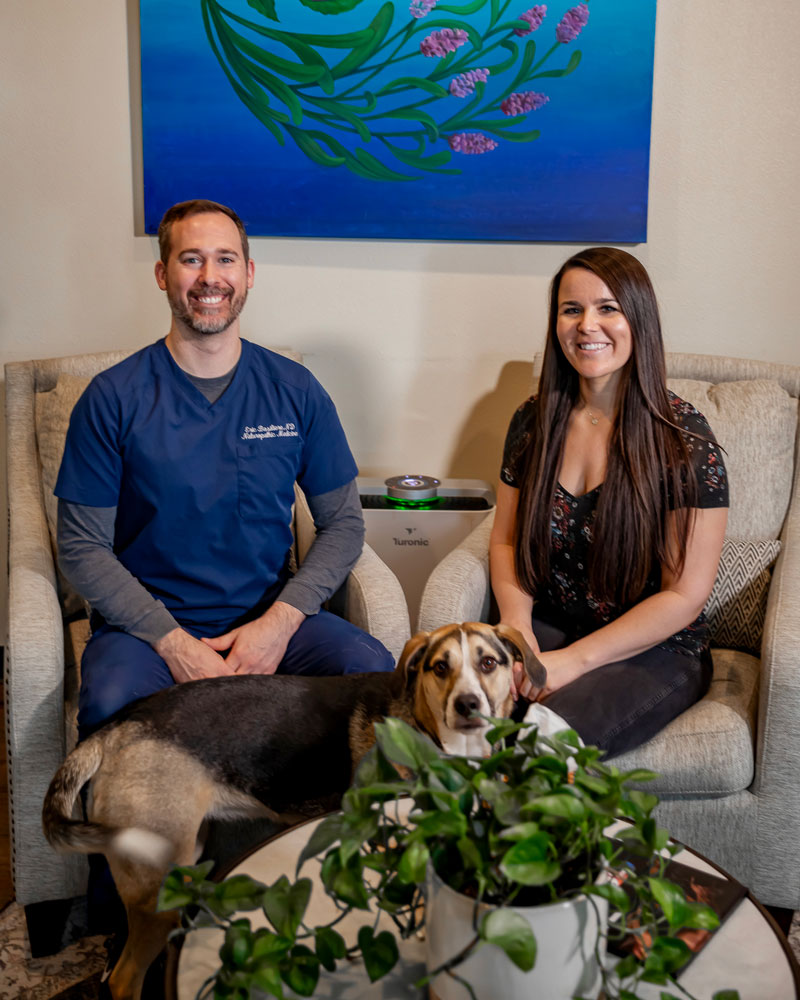 Eric Basiliere and Emily Crockett, owners of Nearing Total Health, seated in the lobby