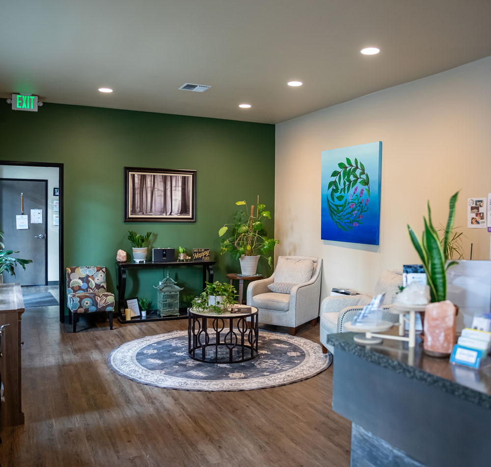 The lobby at Nearing Total Health has inviting colors and comfortable chairs.