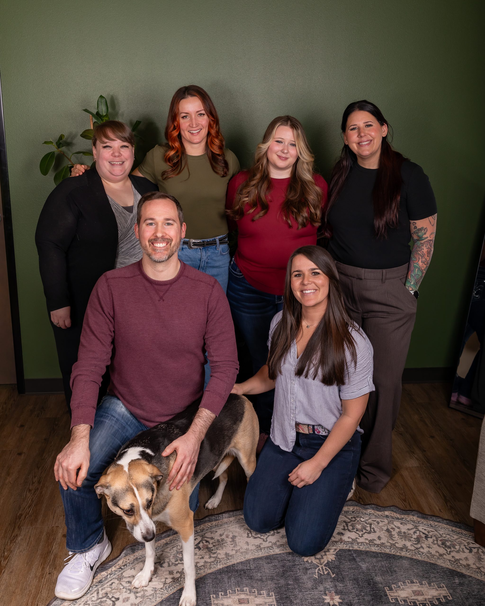 The team at Nearing Total Health, posing in the lobby