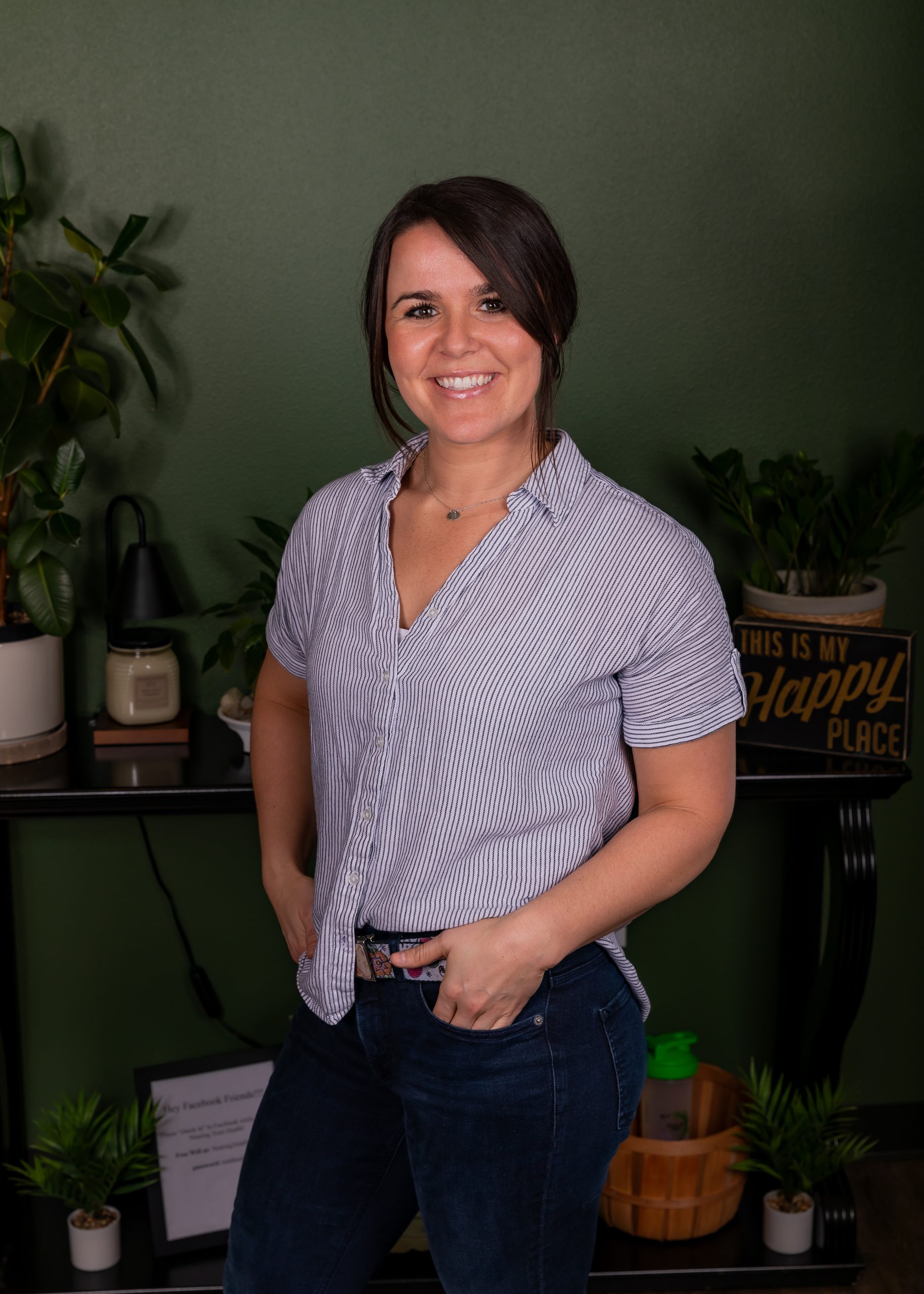 Emily Crockette, LMT standing in the forest