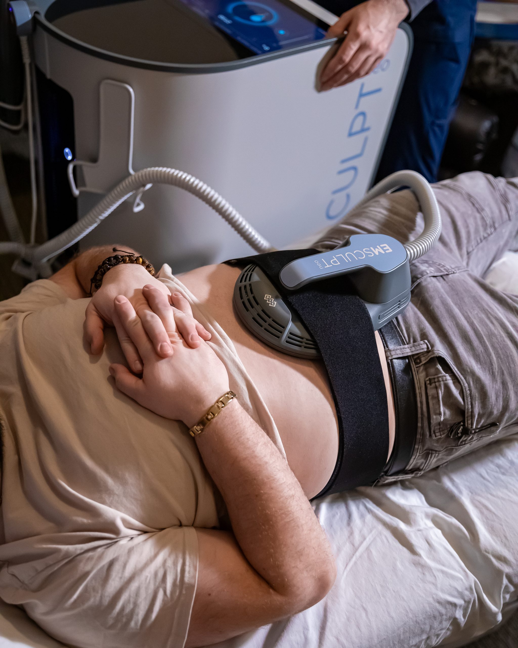 Before and after results of EmSculpt NEO